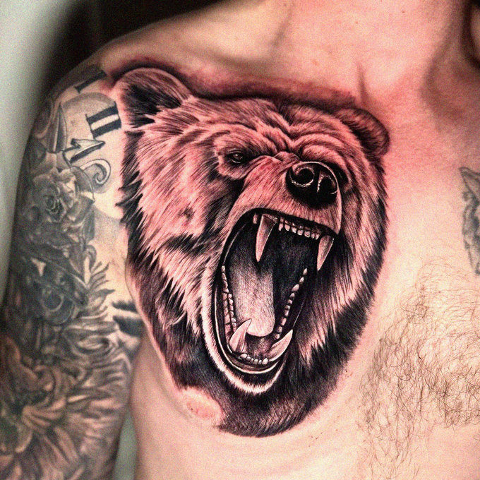 Bear Roar Tattoo Amidst Artistic Ink
