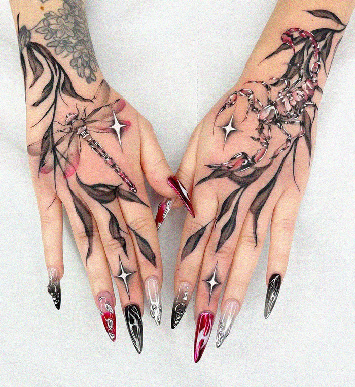 Artistry in Tattoos and Technicolor Nails