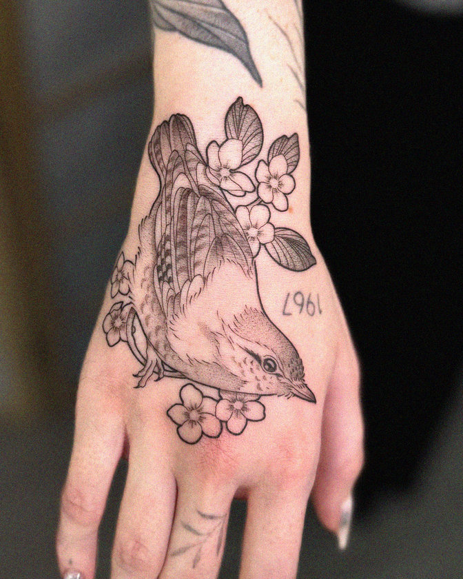 Bird and Blossom Tattoo on Hand