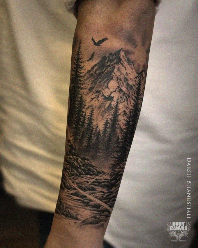 Arm Inked with Monochrome Mountain Majesty