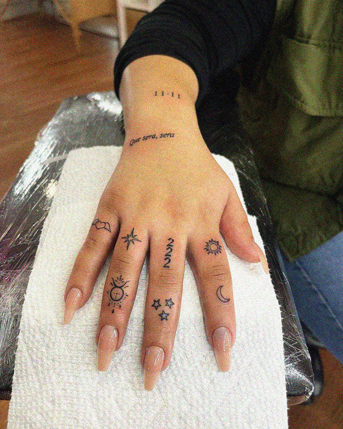 Astrological Ink on Freshly Tattooed Fingers