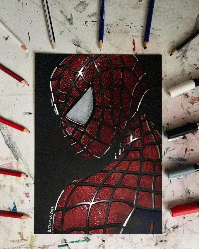 Spider-Man Mask Amidst Artistic Chaos