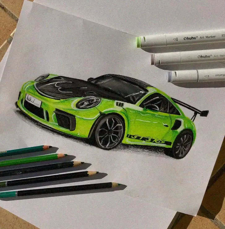 Artist Tools Surrounding a Green Sports Car