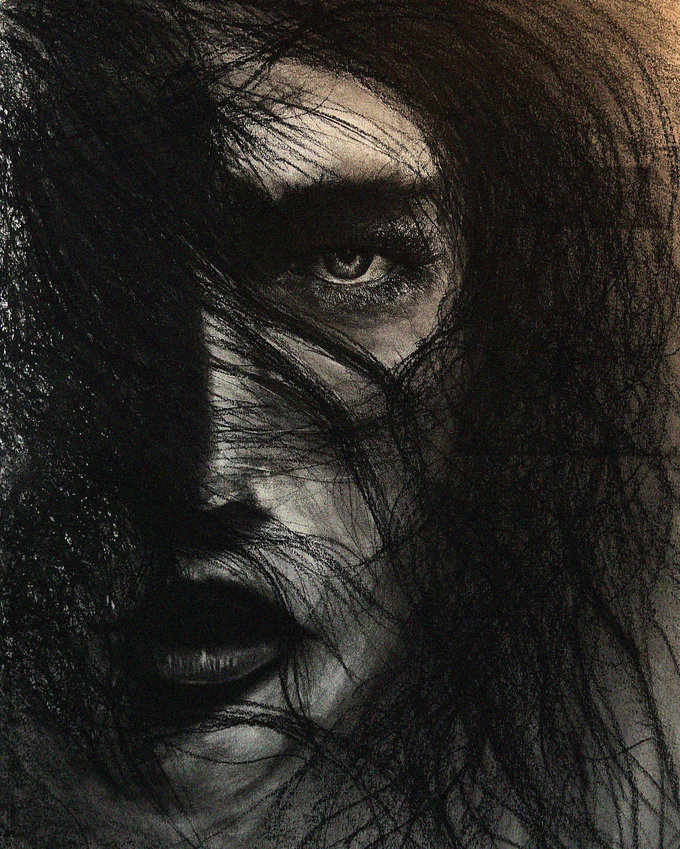 Face in Shadows: A Charcoal Contemplation