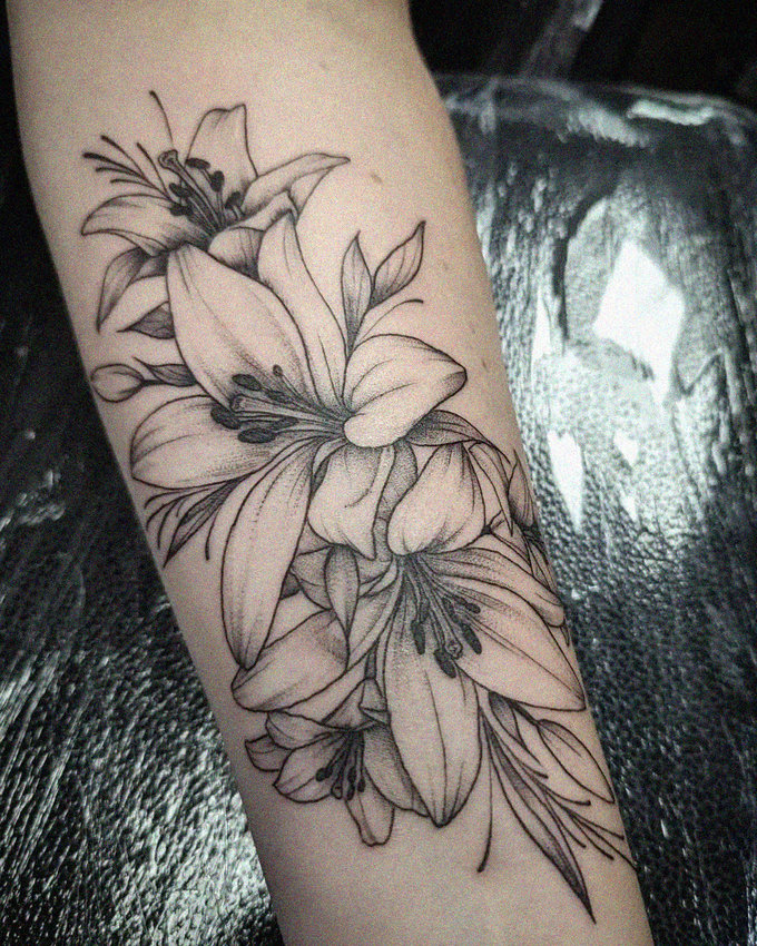 Intricate Monochrome Flower Tattoo Artistry