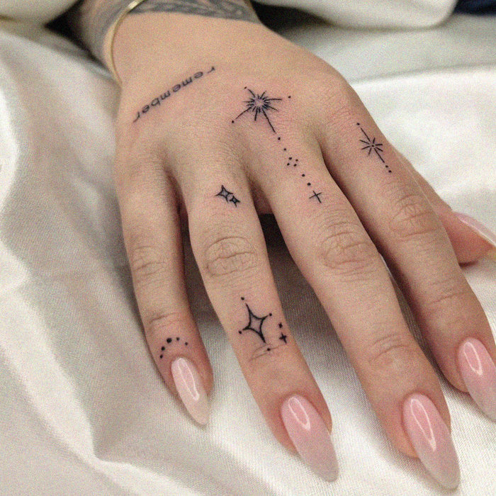 Stellar Ink on Polished Pink Fingers