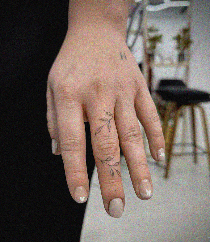 Intimate Portrayal of Floral Fingers and H