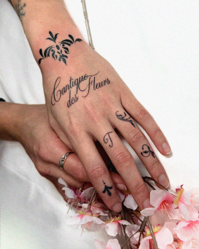 Tattooed Touch in Delicate Blossoms