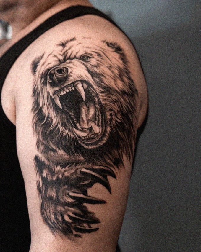 Roaring Bear Tattoo Emblazons Upper Arm