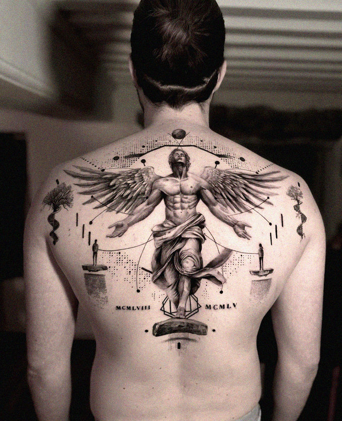 Angelic Imprint: Intricate Back Tattoo Revealed