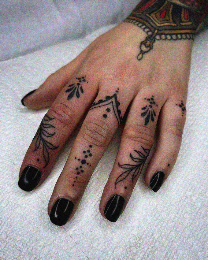 Dark Enigma: Resting Inked Hand