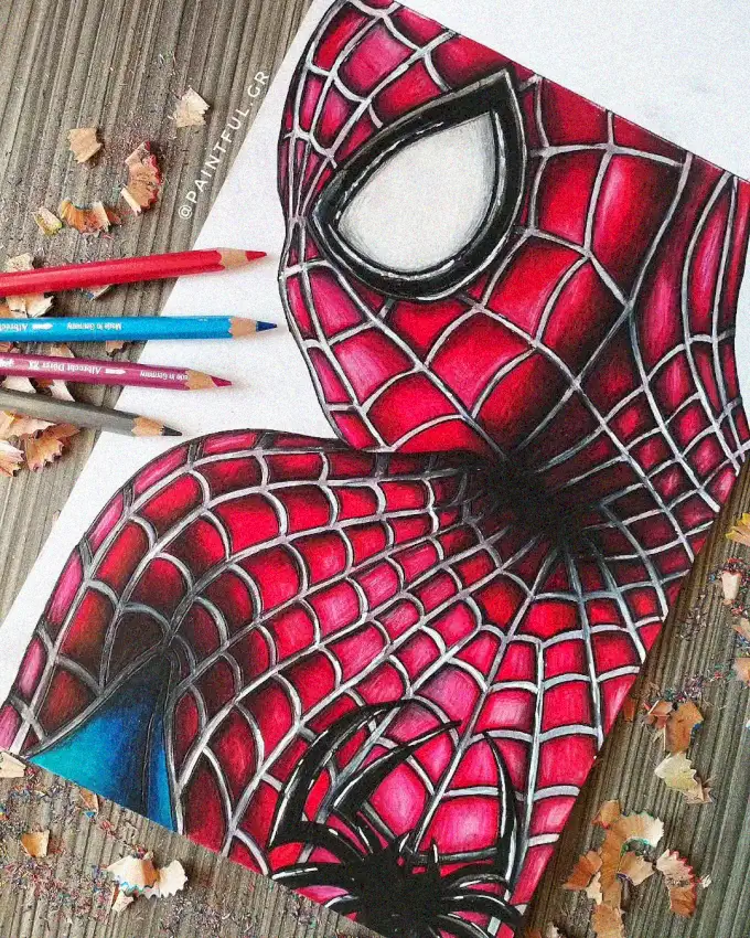Hand-Drawn Spider-Man Amidst Colored Pencils