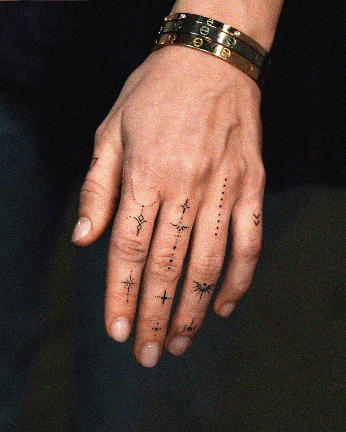 Adorned Hand in Minimalist Tattoo Artistry