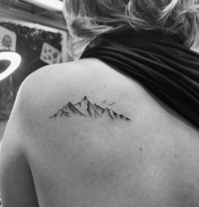 Mountain Range Tattoo on Monochrome Canvas
